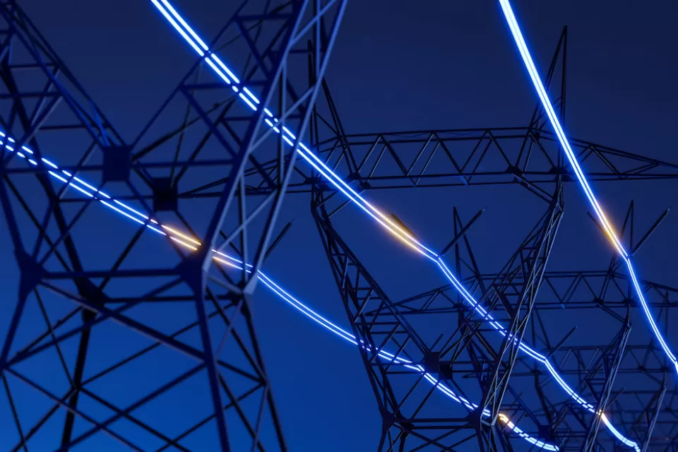 Power powers at night with 'glowing' power lines emphasizes with graphics.
